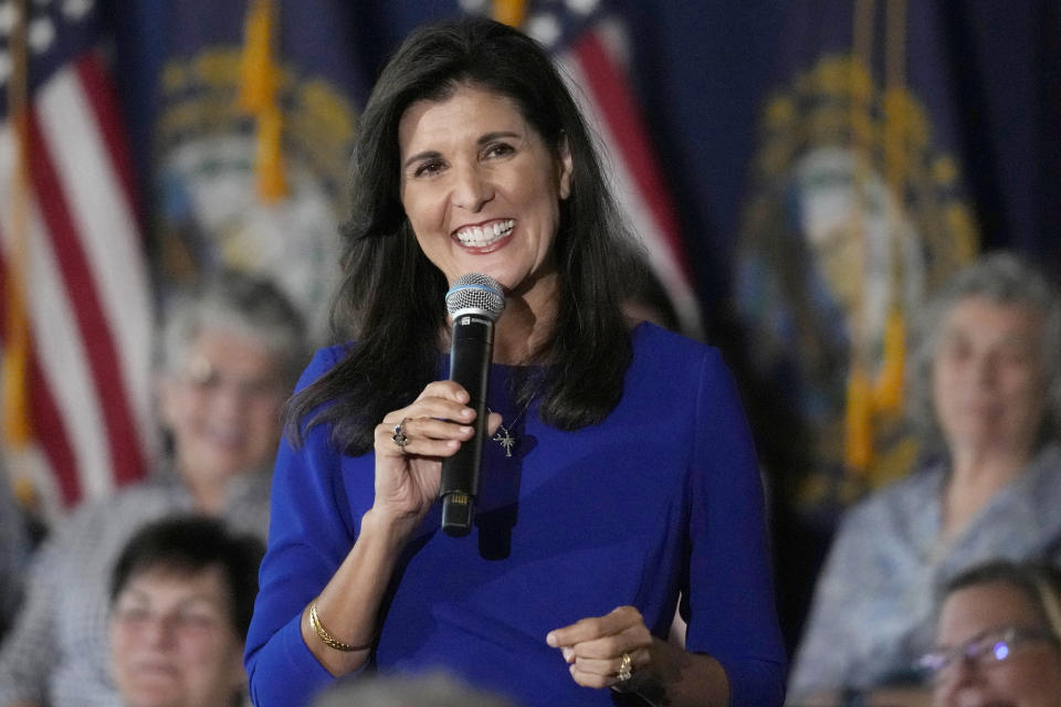 FILE - Republican presidential candidate Nikki Haley smiles while taking a question from the audience during a campaign gathering, May 24, 2023, in Bedford, N.H. Haley’s husband will soon begin a yearlong deployment with the South Carolina Army National Guard to Africa. The mission will encompass most of the remainder of his wife’s campaign for the 2024 Republican presidential nomination. A person with knowledge of Michael Haley’s deployment tells The Associated Pres that a formal deployment ceremony will likely happen in several weeks. It'll be Michael Haley’s second active-duty deployment since he joined the Guard as an officer in 2006. (AP Photo/Charles Krupa, File)