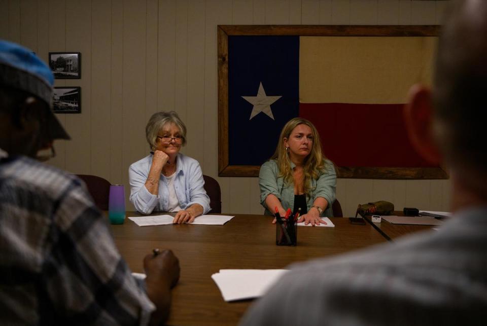 Mary Ann Davis, a member of Kennard’s City Council, and April Wright, Kennard’s City Administrator, attend a City Council meeting in Kennard, Texas, U.S., on Monday, April 8, 2024. The city of Kennard has canceled its City Council elections for at least the 18th time.