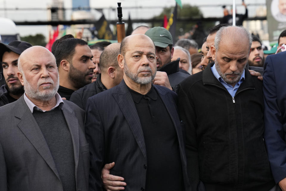 Palestinian Senior Hamas leader Moussa Abu Marzouk, center, attends the funeral of Saleh Arouri, in Beirut, Lebanon, Thursday, Jan. 4, 2024. Arouri, one of the top Hamas commanders, was killed in an apparent Israeli strike. (AP Photo/Hussein Malla)