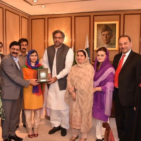 Malala Yousafzai was welcomed by Pakistan's Prime Minister, Shahid Khaqan Abbasi, on her first trip back to her homeland since being shot by the Taliban in 2012 (picture from Twitter). - Credit: Pakistan Government/Twitter