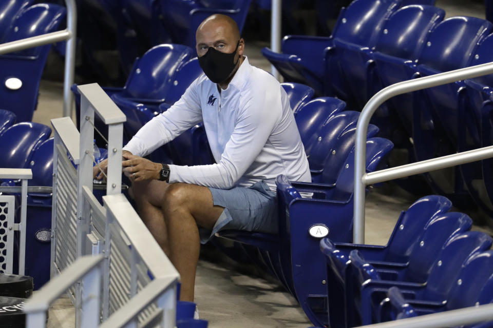 FILE - In this Wednesday, July 8, 2020, file photo, Miami Marlins CEO Derek Jeter watches baseball practice at Marlins Park in Miami. (AP Photo/Lynne Sladky, File)