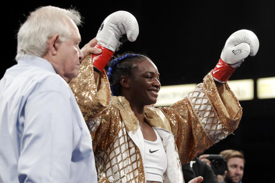 Claressa Shields celebrates her win against Belgium's Femke Hermans during their WBC/IBF/WBA middleweight title boxing match, Saturday, Dec. 8, 2018, in Carson, Calif. (AP Photo/Chris Carlson)