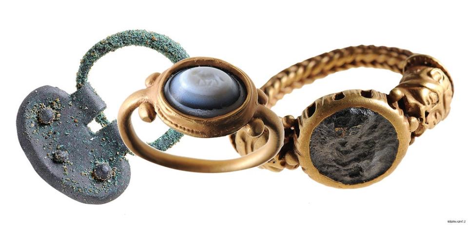 Two Roman rings and a section of a belt buckle were found by a member of the public at Murlough. (NMNI/PA)