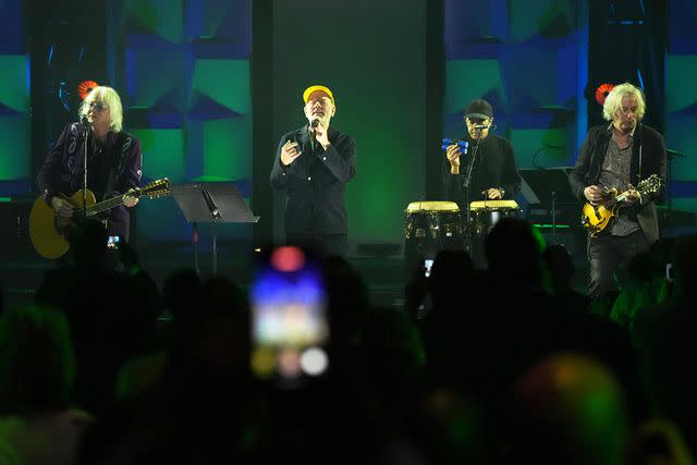 <p>Bennett Raglin/Getty</p> Mike Mills, Michael Stipe, Bill Berry and Peter Buck, of R.E.M., perform onstage during the 2024 Songwriters Hall of Fame Induction and Awards Gala at New York Marriott Marquis Hotel on June 13, 2024 in New York City.