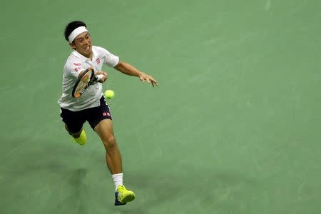 Sep 9, 2016; New York, NY, USA; Kei Nishikori of Japan returns a shot to Stan Wawrinka of Switzerland on day twelve of the 2016 U.S. Open tennis tournament at USTA Billie Jean King National Tennis Center. Mandatory Credit: Anthony Gruppuso-USA TODAY Sports