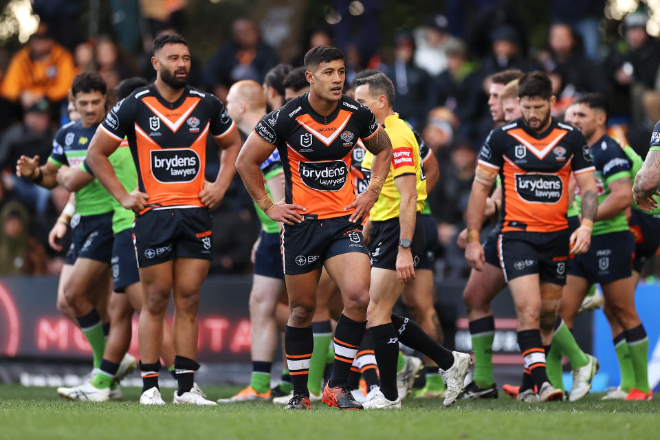 Tigers players, pictured here looking on during their clash with the Raiders.