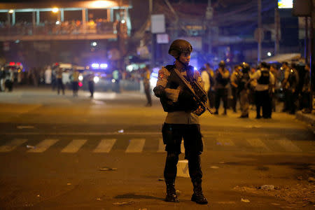 Police guard at scene of an explosion in Jakarta, Indonesia May 24, 2017. REUTERS/Darren Whiteside 