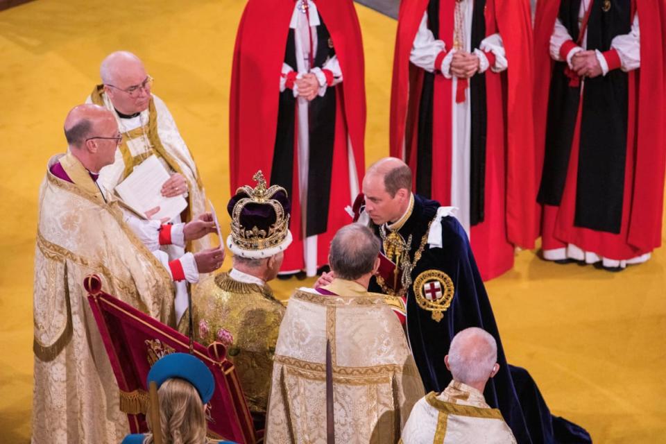 <div class="inline-image__caption"><p>Prince William holds the hands of his father King Charles III during his coronation ceremony in Westminster Abbey, London.</p></div> <div class="inline-image__credit">Gary Calton/Pool via REUTERS</div>