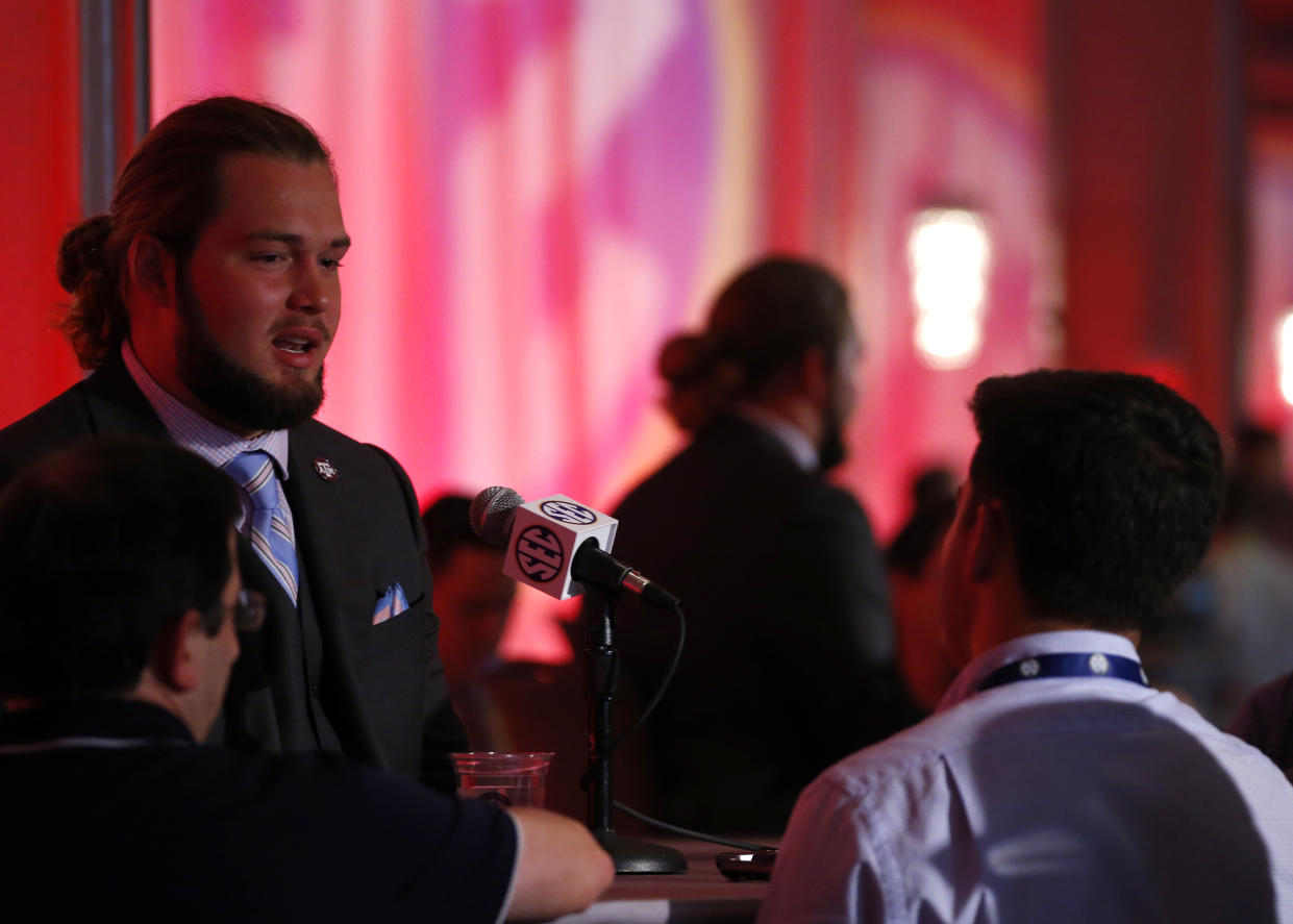 Texas A&M NCAA college football player Koda Martin speaks during the Southeastern Conference’s annual media gathering, Wednesday, July 12, 2017, in Hoover, Ala. (AP Photo/Butch Dill)