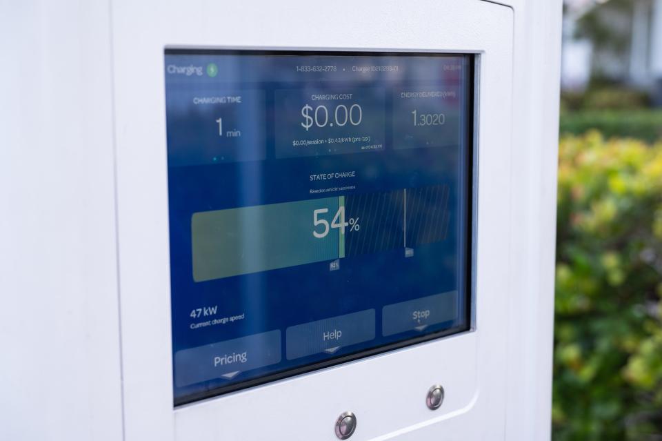 The user interface of a level 3 electric vehicle charger is seen on Tuesday, February 7, 2023, in Delray Beach, FL. Users at a charging station can refer to the screen to view the estimated amount of time left to their designated full charge, as well as the fee incurred for the electricity.