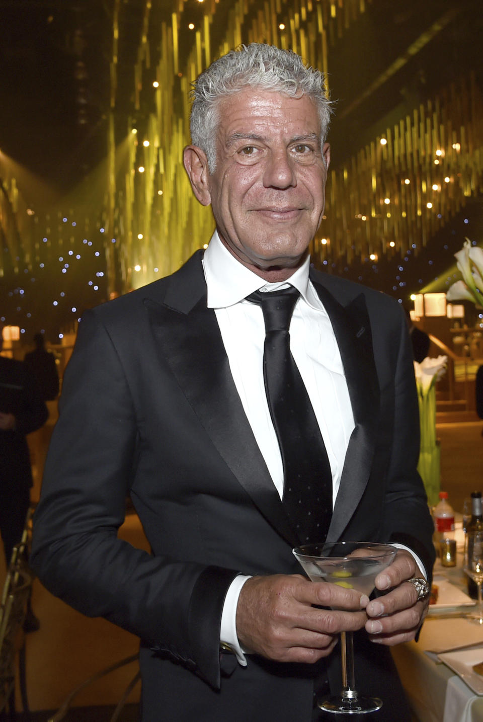 FILE - In this Saturday, Sept. 9, 2017, file photo, Anthony Bourdain attends the Governors Ball during night one of the Creative Arts Emmy Awards at the Microsoft Theater in Los Angeles. The revelation that a documentary filmmaker used voice-cloning software to make the late chef Bourdain say words he never spoke has drawn criticism amid ethical concerns about use of the powerful technology. The movie “Roadrunner: A Film About Anthony Bourdain” appeared in cinemas Friday, July 16, 2021, and mostly features real footage of the beloved celebrity chef and globe-trotting television host before he died in 2018. (Photo by Richard Shotwell/Invision/AP, File)