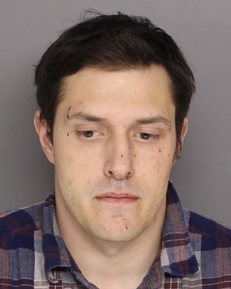 This booking photo provided by Baltimore County police shows Joseph Phillip Svezzese. Baltimore County police have captured Jacob William Rogge, suspected of robbing a convenience store on Saturday, March 17, 2019 dressed in a unicorn costume. Rogge donned a pink-and-white unicorn costume and smashed a High's Dairy Store register with a crowbar. Police say Svezzese drove Rogge, who fled with cash and cigarettes.(Baltimore County police via AP)