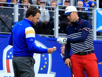 AUCHTERARDER, SCOTLAND - SEPTEMBER 28: Graeme McDowell of Europe and Jordan Spieth of the United States on the 1st tee during the Singles Matches of the 2014 Ryder Cup on the PGA Centenary course at the Gleneagles Hotel on September 28, 2014 in Auchterarder, Scotland. (Photo by David Cannon/Getty Images)