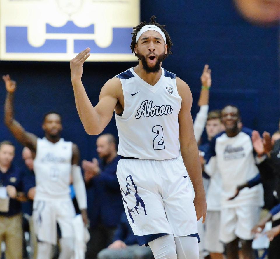 Akron's Kwan Cheatham Jr (2) celebrates after sinking a first-half 3-pointer against Georgia Southern, Tuesday, Nov. 22, 2016 at Rhodes Arena.