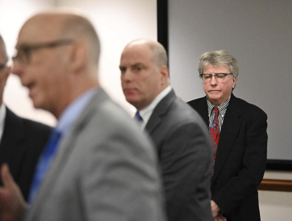 Defendant Kevin Monahan, right, stands in court during opening statements for his murder trial, Thursday, Jan. 11, 2024, at the Washington County Courthouse in Fort Edward, N.Y. Monahan, 66, is accused of fatally shooting 20-year-old Kaylin Gillis on the night of April 15, 2023, after she and friends accidentally pulled into his driveway in rural Hebron. He is charged with second-degree murder, reckless endangerment and tampering with physical evidence. (Will Waldron/The Albany Times Union via AP, Pool)