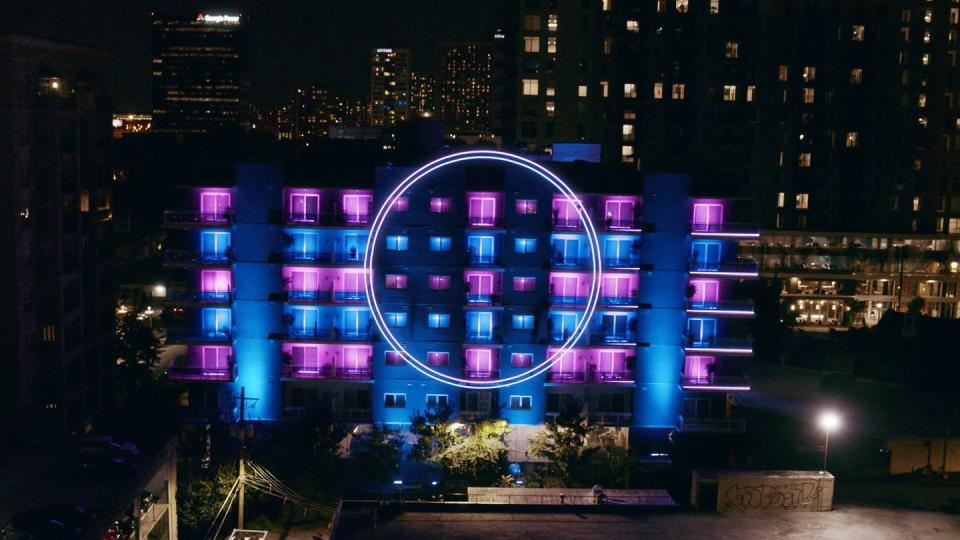 a large purple structure with lights