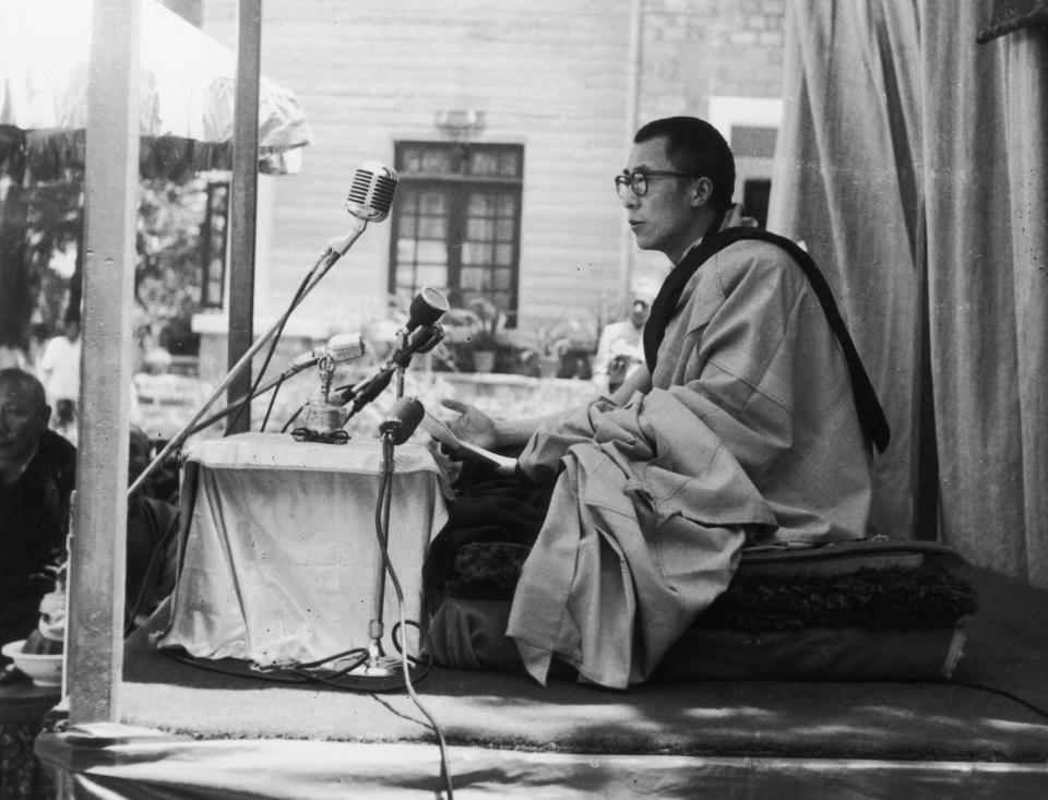 The Dalai Lama gives a speech in this photo from around 1955.&nbsp;