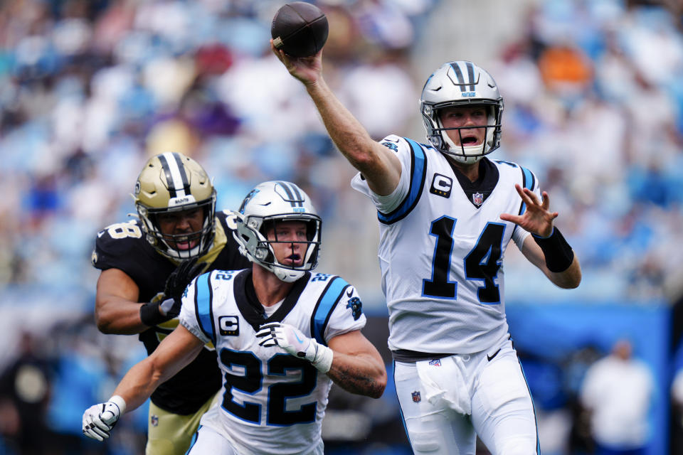 Carolina Panthers quarterback Sam Darnold passes against the New Orleans Saints during the first half of an NFL football game Sunday, Sept. 19, 2021, in Charlotte, N.C. (AP Photo/Jacob Kupferman)