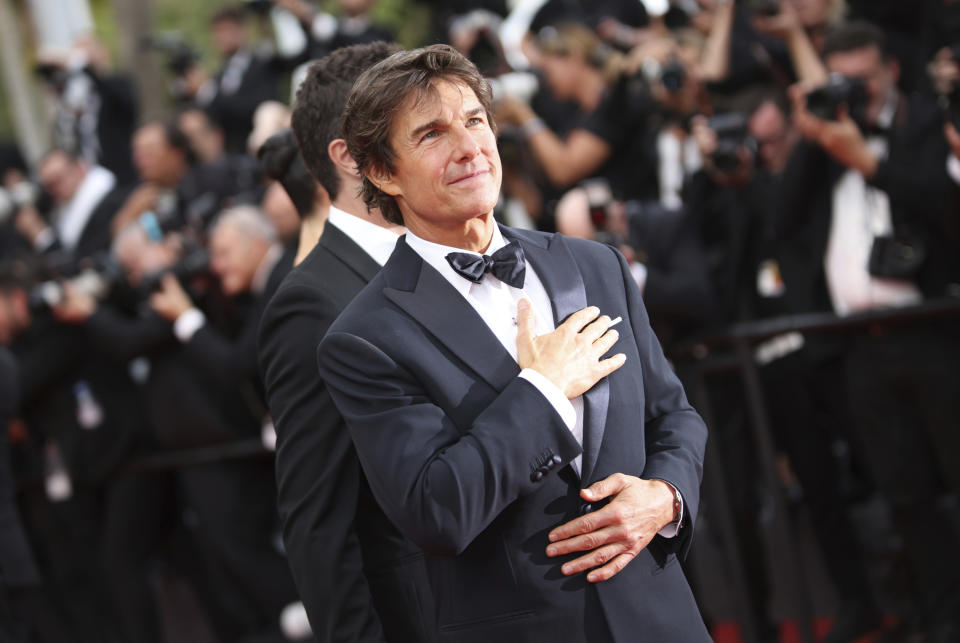 Tom Cruise llega al estreno de "Top Gun: Maverick" en la 75ta edición del Festival Internacional de Cine de Cannes, en el sur de Francia, el miércoles 18 de mayo de 2022. (Foto por Vianney Le Caer/Invision/AP)