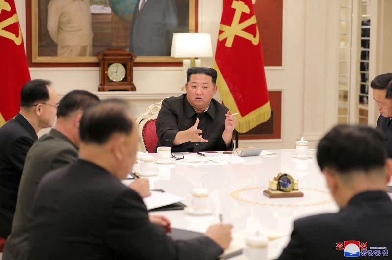 FILE PHOTO: North Korean leader Kim Jong Un presides over a politburo meeting of the ruling Workers' Party