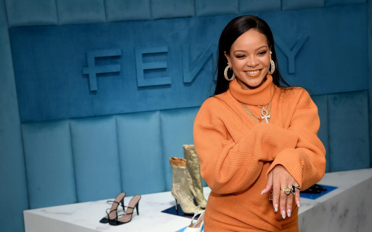 Robyn Rihanna Fenty and Linda Fargo celebrate the launch of FENTY in 2020