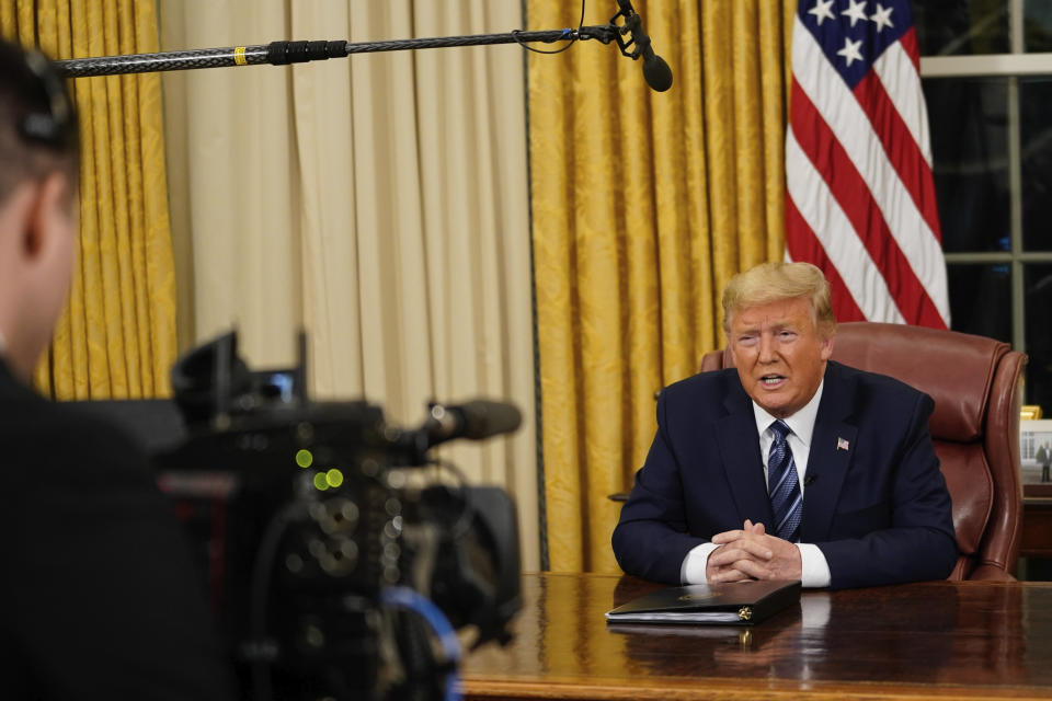 President Donald Trump speaks in an address to the nation from the Oval Office at the White House about the coronavirus Wednesday, March, 11, 2020, in Washington. (Doug Mills/The New York Times via AP, Pool)