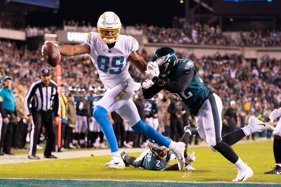 Chargers tight end Donald Parham (89) scores a touchdown past Philadelphia Eagles linebacker Davion Taylor.