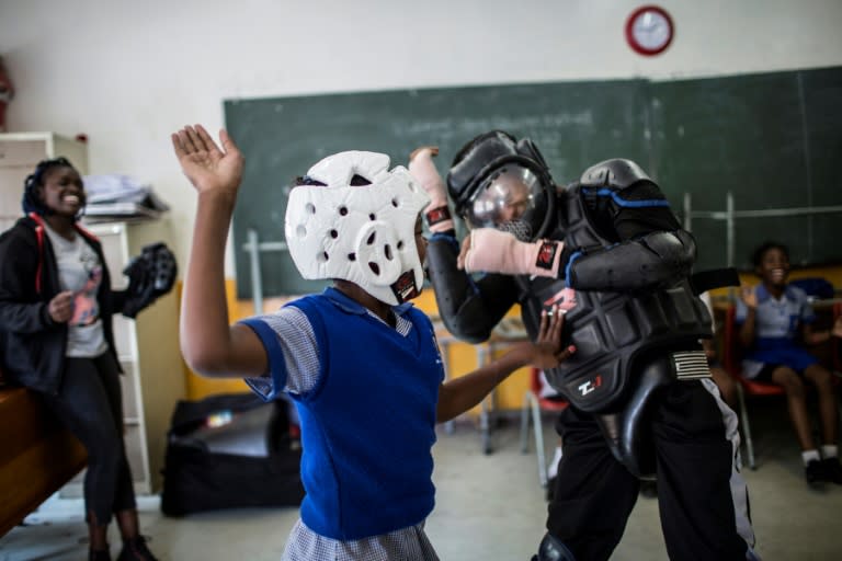 Girls are taught how to defend themselves physically but also how to identify and respond to potentially dangerous situations