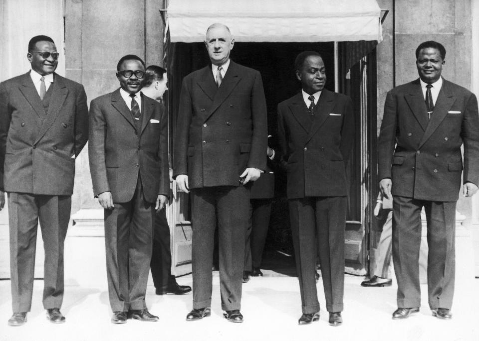 FILE - French President Charles de Gaulle of France poses with the four presidents of the states of the African Entente Council after a summit in Paris, France on March 7, 1961. L-R: President Hamani Diori of Niger; President Maurice Yameogo of Upper Volta, now Burkina Faso; President Felix Houphouet-Boigny of the Ivory Coast; and President Hubert Maga of Dahomey, now Benin. African and French pundits, politicians and people alike say France has taken too long to shuck its long, postcolonial tradition of "Françafrique." It's an unflattering term that smacks of paternalistic influence and quiet deal-making among elites.(AP Photo/Levy, File)