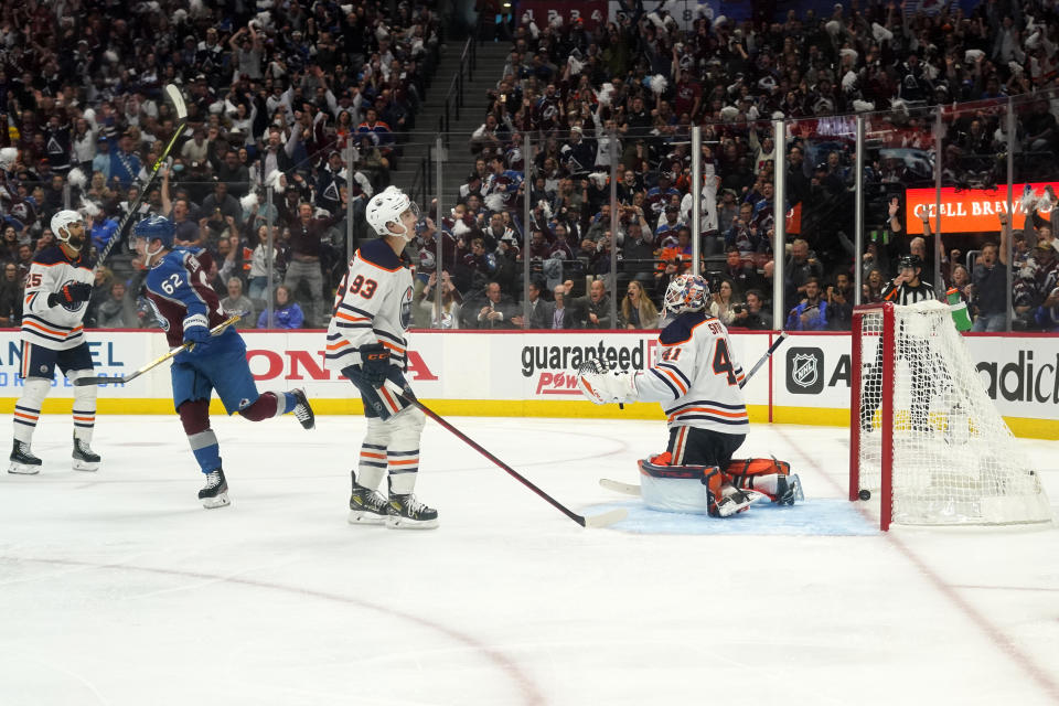 Colorado Avalanche left wing Artturi Lehkonen (62) celebrates a goal against Edmonton Oilers goaltender Mike Smith (41) during the second period in Game 2 of the NHL hockey Stanley Cup playoffs Western Conference finals Thursday, June 2, 2022, in Denver. (AP Photo/Jack Dempsey)