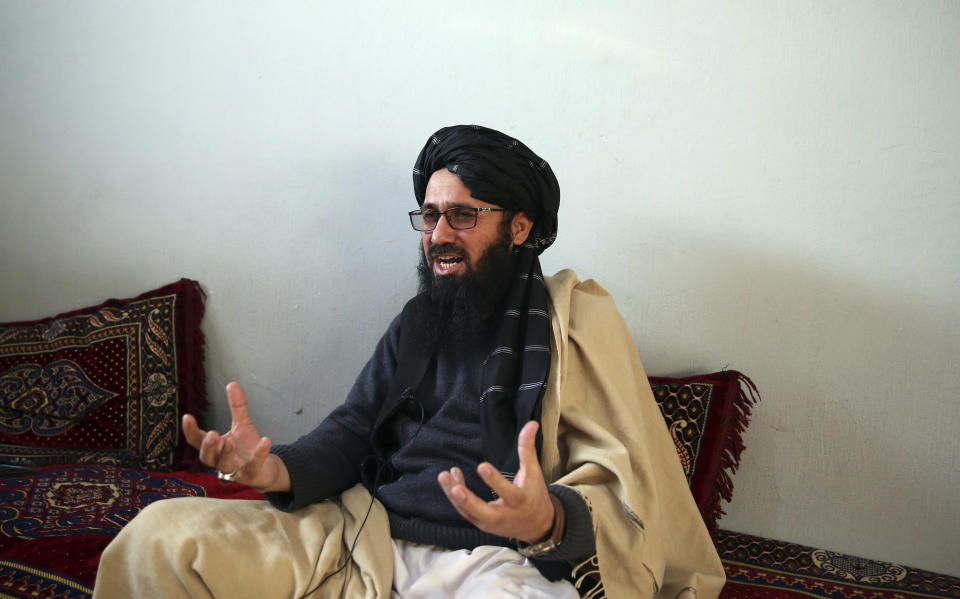 In this Saturday, Dec. 14, 2019, photo, Maulvi Niaz Mohammad, 45, speaks during an interview with The Associated Press inside the Pul-e-Charkhi jail in Kabul, Afghanistan. Thousands of Taliban prisoners jailed as insurgents see a peace deal being hammered out in Qatar as their ticket to freedom. Prisoner release is a key pillar of any agreement the U.S. strikes with the Taliban to end Afghanistan’s 18-year war. (AP Photo/Rahmat Gul)