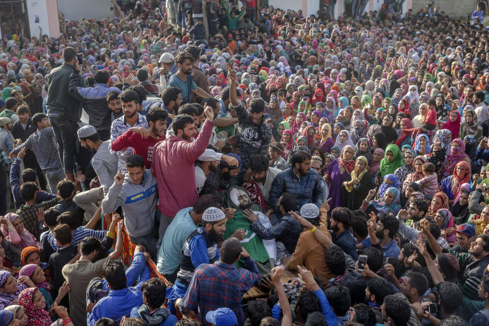 Kashmiri villagers shout slogans as they carry the body of top rebel commander Gulzar Ahmed Paddroo during his funeral procession in Aridgeen, about 75 kilometers south of Srinagar, Indian controlled Kashmir, Saturday, Sept 15, 2018. Indian troops laid a siege around a southern village in Qazigund area overnight on a tip that militants were hiding there, police said. A fierce gunbattle erupted early Saturday, and hours later, five local Kashmiri rebels were killed. (AP Photo/Dar Yasin)