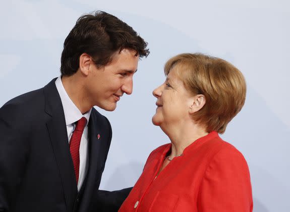 HAMBURG, GERMANY - JULY 07: German Chancellor Angela Merkel officially welcomes Canadian Prime Minister, Justin Trudeau to the opening day of the G20 summit on July 7, 2017 in Hamburg, Germany. Leaders of the G20 group of nations are meeting for the July 7-8 summit. Topics high on the agenda for the summit include climate policy and development programs for African economies. (Photo by Friedemann Vogel - Pool/Getty Images)