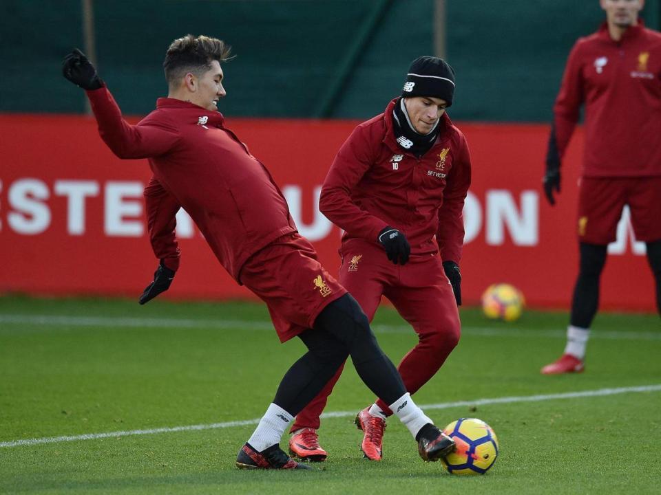 The pair in training together at Liverpool (Getty)