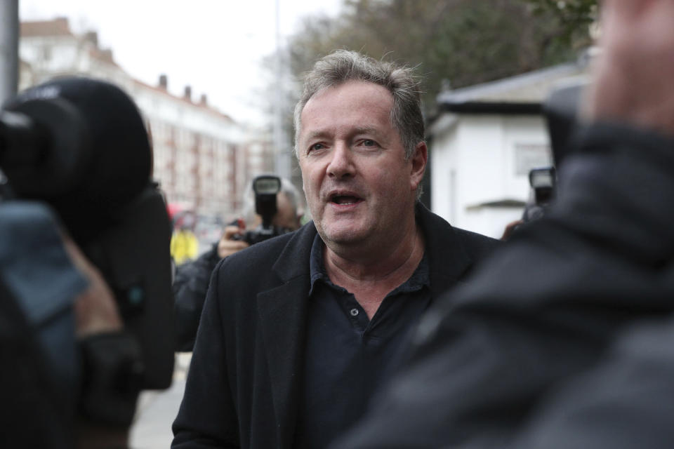 British television host Piers Morgan speaks to reporters outside his home in Kensington, central London, Wednesday March 10, 2021. Morgan quit the “Good Morning Britain” program on Tuesday after making controversial comments about the Duchess of Sussex. The U.K.’s media watchdog said earlier Tuesday it was launching an investigation into the show under its harm and offense rules after receiving more than 41,000 complaints about Morgan’s comments on Meghan. (Jonathan Brady/PA via AP)