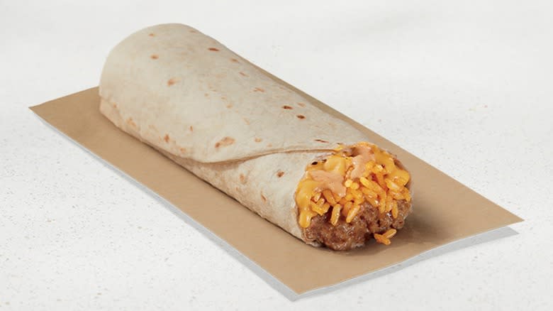 Cheesy Bean and Rice Burrito on brown paper