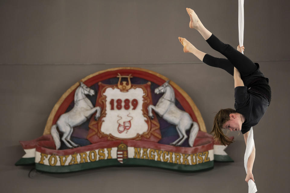 A young Ukrainian refugee circus student practicing in a training room in Budapest, Hungary, Monday, Feb. 13, 2023. More than 100 Ukrainian refugee circus students, between the ages of 5 and 20, found a home with the Capital Circus of Budapest after escaping the embattled cities of Kharkiv and Kyiv amid Russian bombings. (AP Photo/Denes Erdos)