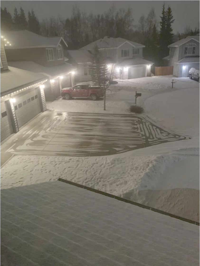 Melted snow on a driveway