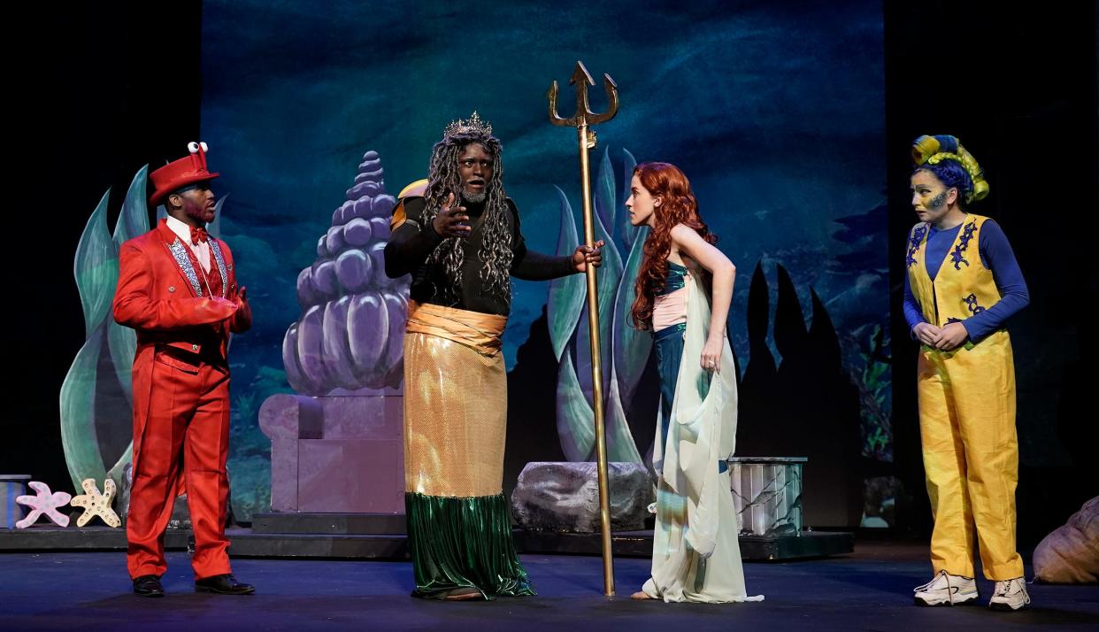 Zachary Flack as Sebastian, Brian Jones as King Triton, Emma Skaggs as Ariel, and Ella Flumignan as Flounder are pictured in a scene from "The Little Mermaid" at the Croswell Opera House.