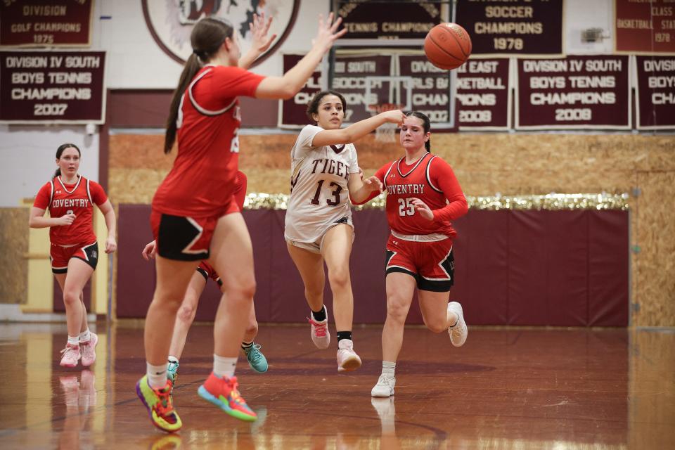 Izabell Williams makes a pass during Friday night's preliminary round playoff game against Coventry.