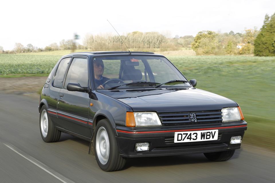 <p>Available with either a <strong>104bhp </strong>1.6-litre or a <strong>130bhp </strong>1.9-litre, the 205 GTi had McPherson front struts and a compact trailing arm setup at the rear, combined with communicative steering, allowing it to rival some bigger and more powerful cars in handling. The 1.9-litre offered suspension tweaks to reduce pitch and roll and combat the understeer that could be found on earlier 1.6 cars. It became increasingly popular because of its price-performance ratio and is still considered one of the world’s best front-wheel drive cars to this day.</p>