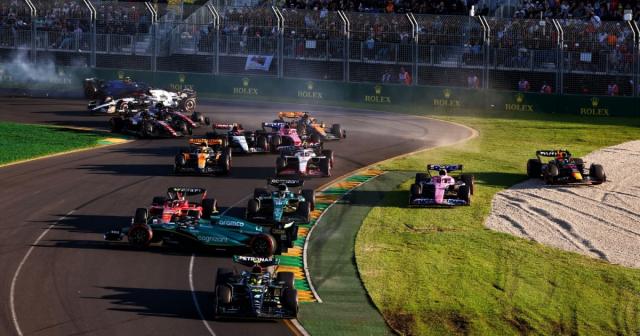 Aston Martin driver Fernando Alonso gets spun at the restart of the Australian Grand Prix. Melbourne, March 2023. Credit: Alamy