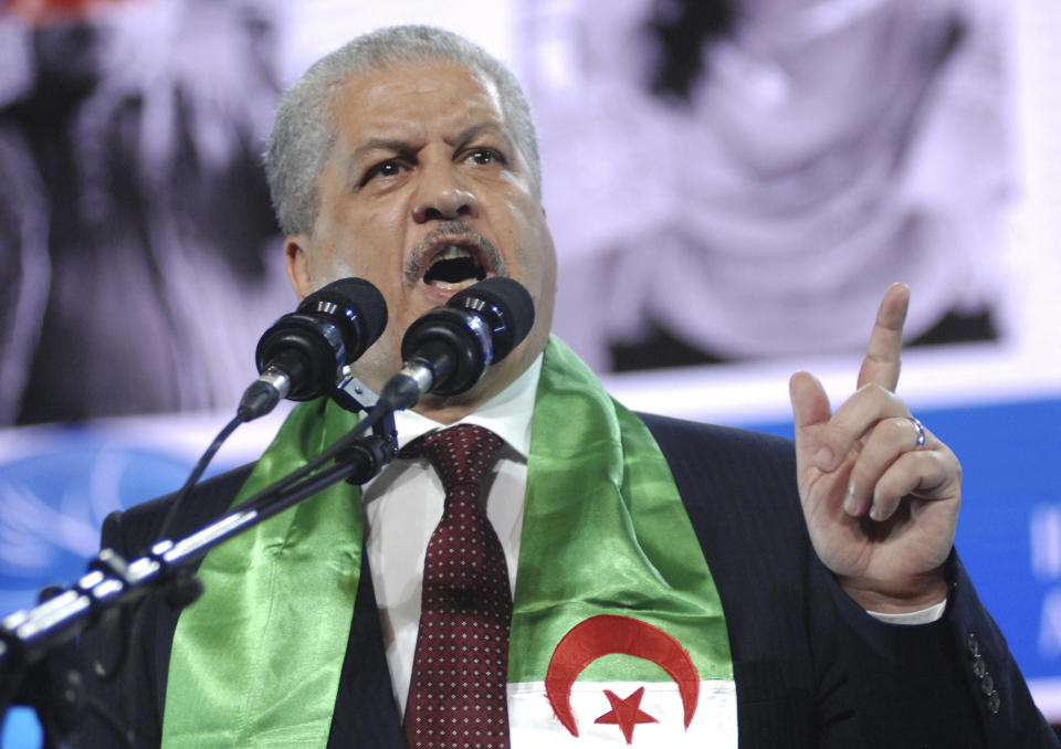 FILE - In this April 13, 2014 file photo, President Abdelaziz Bouteflika's campaign manager, Abdelmalek Sellal, delivers a speech to supporters in Algiers. Former Algerian Prime Minister Abdelmalek Sellal has been jailed in an anti-corruption sweep — the second former head of government in two days to be sent to prison while his case is investigated. (AP Photo/Sidali Djarboub, File)