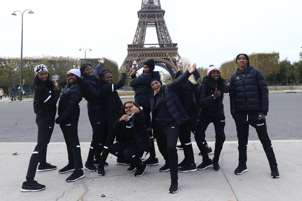 South Carolina college basketball players pose in front of the Eiffel Tower, Thursday Nov. 2, 2023 in Paris. Notre Dame will face South Carolina in a NCAA college basketball game Monday Nov. 6 in Paris. (AP Photo/Aurelien Morissard)