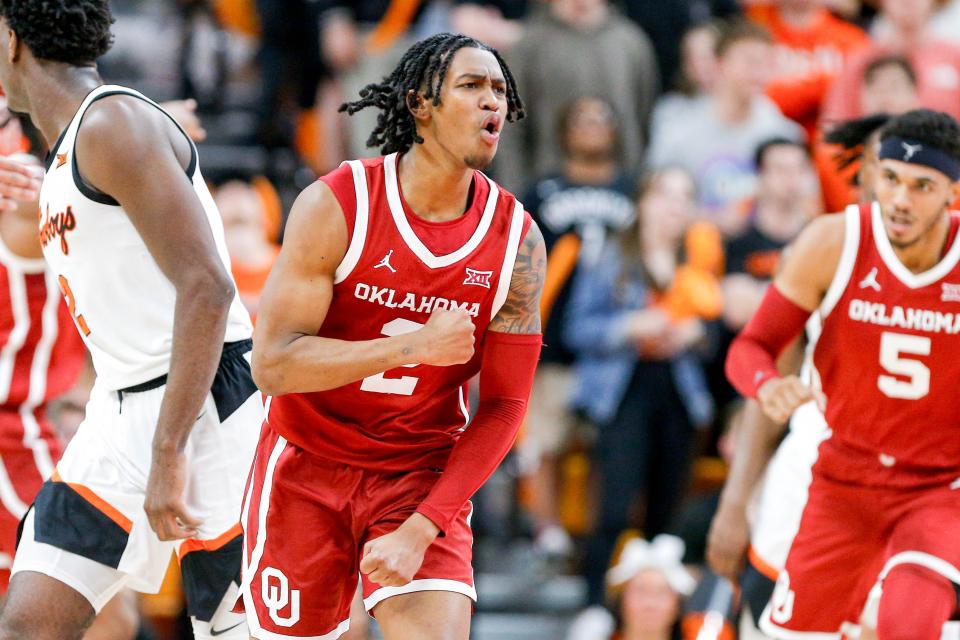 Oklahoma guard Javian McCollum (2) celebrates scoring in the second half during an NCAA basketball game between Oklahoma and Oklahoma State in Stillwater, Okla., on Saturday, Feb. 24, 2024.