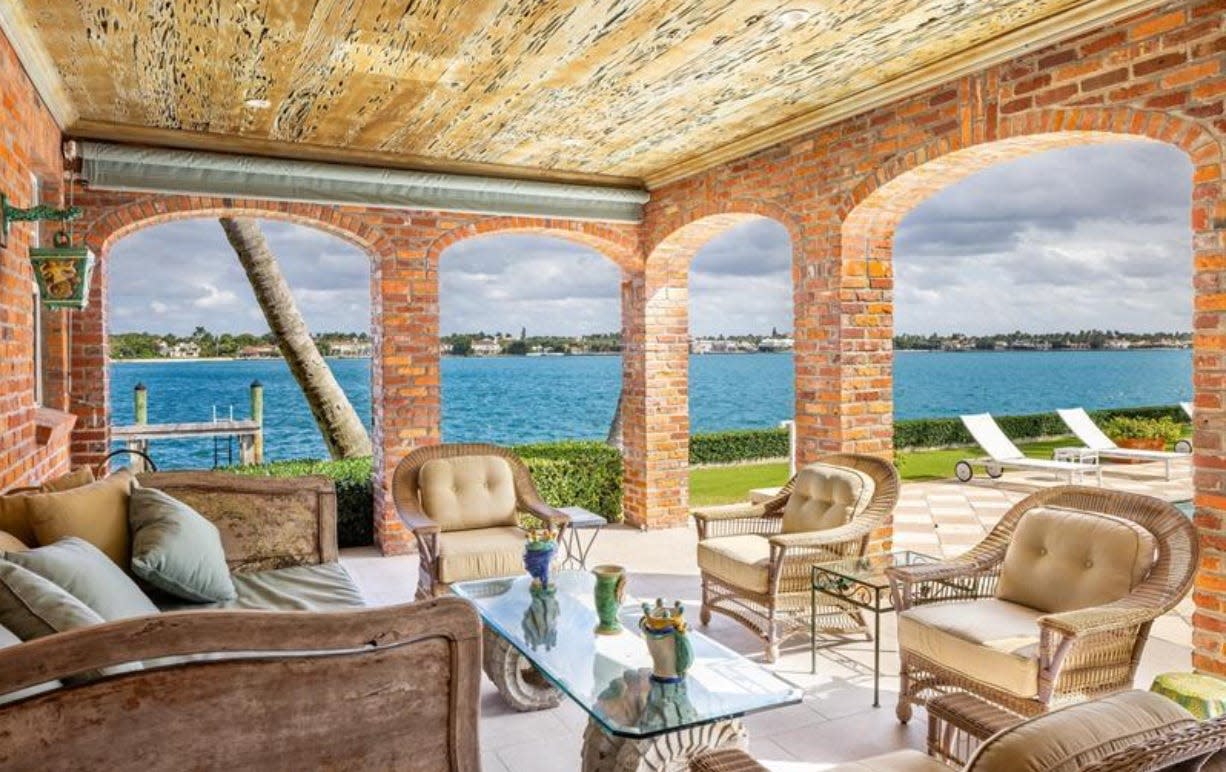 The rear loggia at 690 Island Drive in Palm Beach looks out to the Intracoastal Waterway. The house, which is home to television home-improvement star Bob Vila and his wife, Diana Barrett, was just listed for sale at $52.9 million.