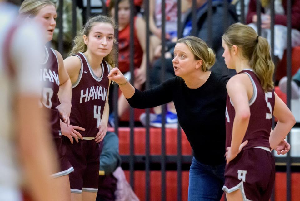 Havana girls basketball coach Michelle Brady doles out some advice for Taryn Wickman (10), Jennifer Bonnett (4) and Josie Hughes in the second half against Brimfield on Monday, Jan. 23, 2023 at Brimfield High School. The Ducks defeated the Indians 39-31.