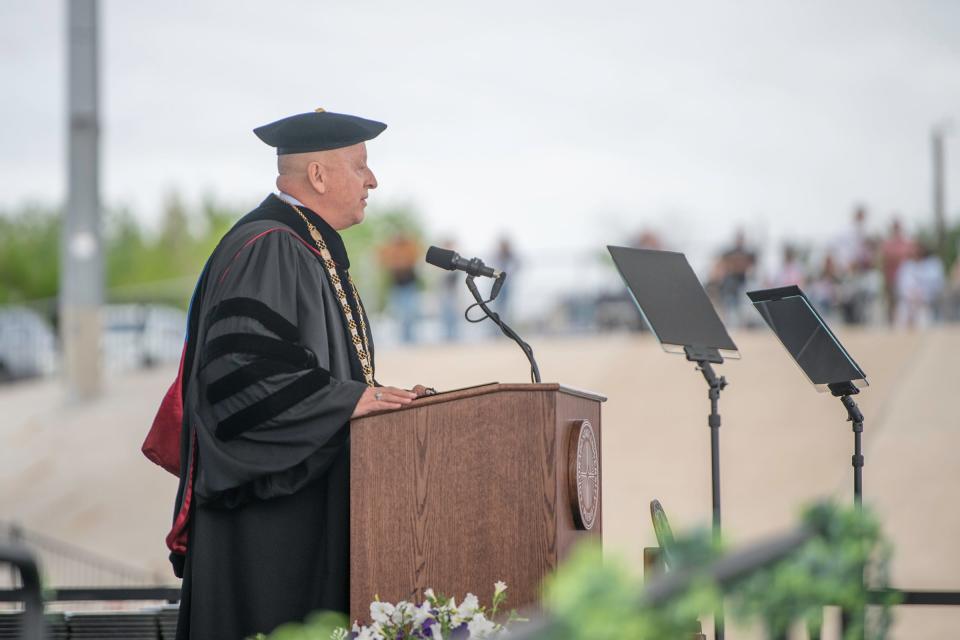 Colorado State University Pueblo President Timothy Mottet speaks to graduates during the school's commencement ceremony on Saturday, May 13, 2023.