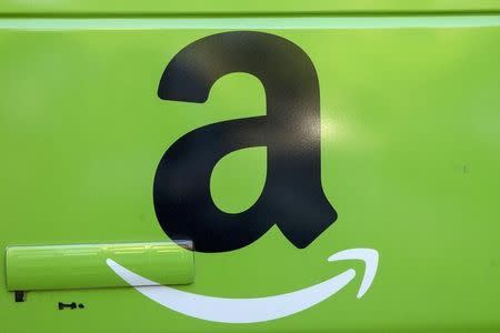 The Amazon.com Inc. logo is seen on the side of a delivery truck in Brooklyn, New York, August 28, 2015. REUTERS/Brendan McDermid