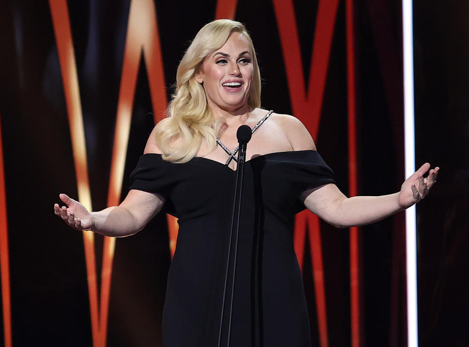 <p><a href="https://people.com/tag/rebel-wilson/" rel="nofollow noopener" target="_blank" data-ylk="slk:Rebel Wilson;elm:context_link;itc:0;sec:content-canvas" class="link ">Rebel Wilson</a> addresses the crowd during the 2022 AACTA Awards presented by Foxtel Group in Sydney on Dec. 7. </p>